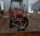 Traktor sa raonikom za čišćenje ulica