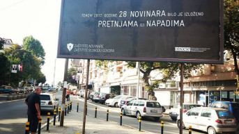 Kosovska Mitrovica, bilbord koji ukazuje na položaj novinara 2017. 