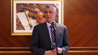Tači