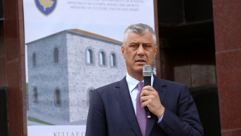 Tači