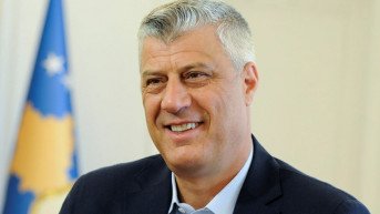 Tači