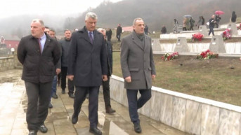 Tači