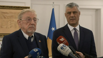 Tači