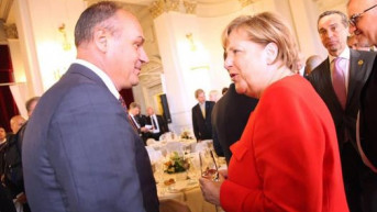 Enver Hodžaj i Angela Merkel.jpg Enver Hodžaj i Angela Merkel.jpg
