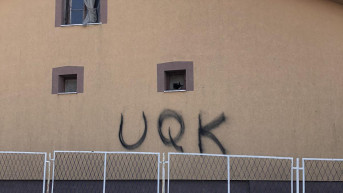 Grafit UČK na kući u Suvom Dolu.jpg Grafit UČK na kući u Suvom Dolu.jpg