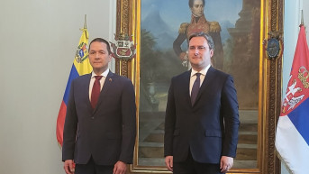 Selaković i šef diplomatije Venecuele Karlosom Farijom.jpg
