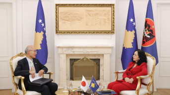 Akiro Mizutani i Vjosa Osmani