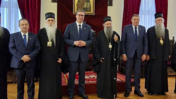 Vučić sa patrijarhom Porfirijem.jpg