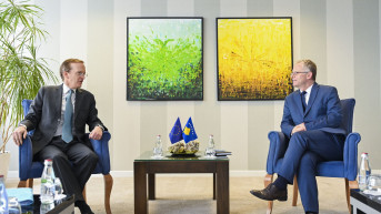 Čarls Fris i Besnik Bisljimi 