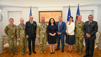 Osmani sa američkim vojnicima Kfora