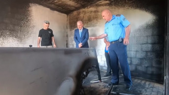 Dželjalj Svečlja u spaljenoj kući porodice Jozić kod Istoka