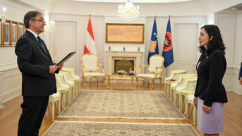 Georg Šnecer i Vjosa Osmani