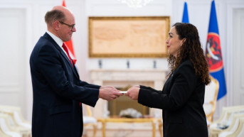 Arne Sanes Bjornstad i Vjosa Osmani