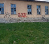Grafiti UCK na zgradi škole u Gojbulji