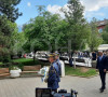 tači