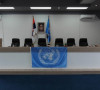 Zastave UN i Srbije na sednici u Zvečanu.jpg