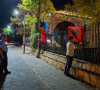 Zastave Albanije i OVK na ogradi kod crkve